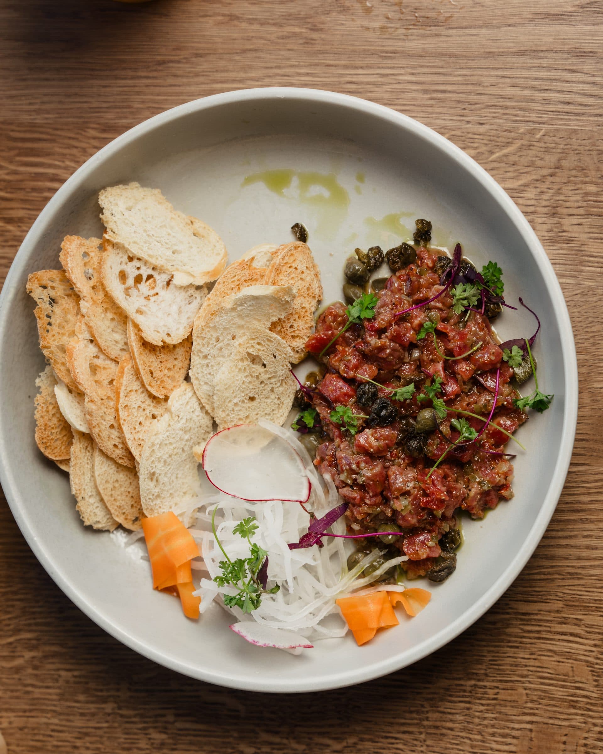 Hand-cut beef tartare with crisps